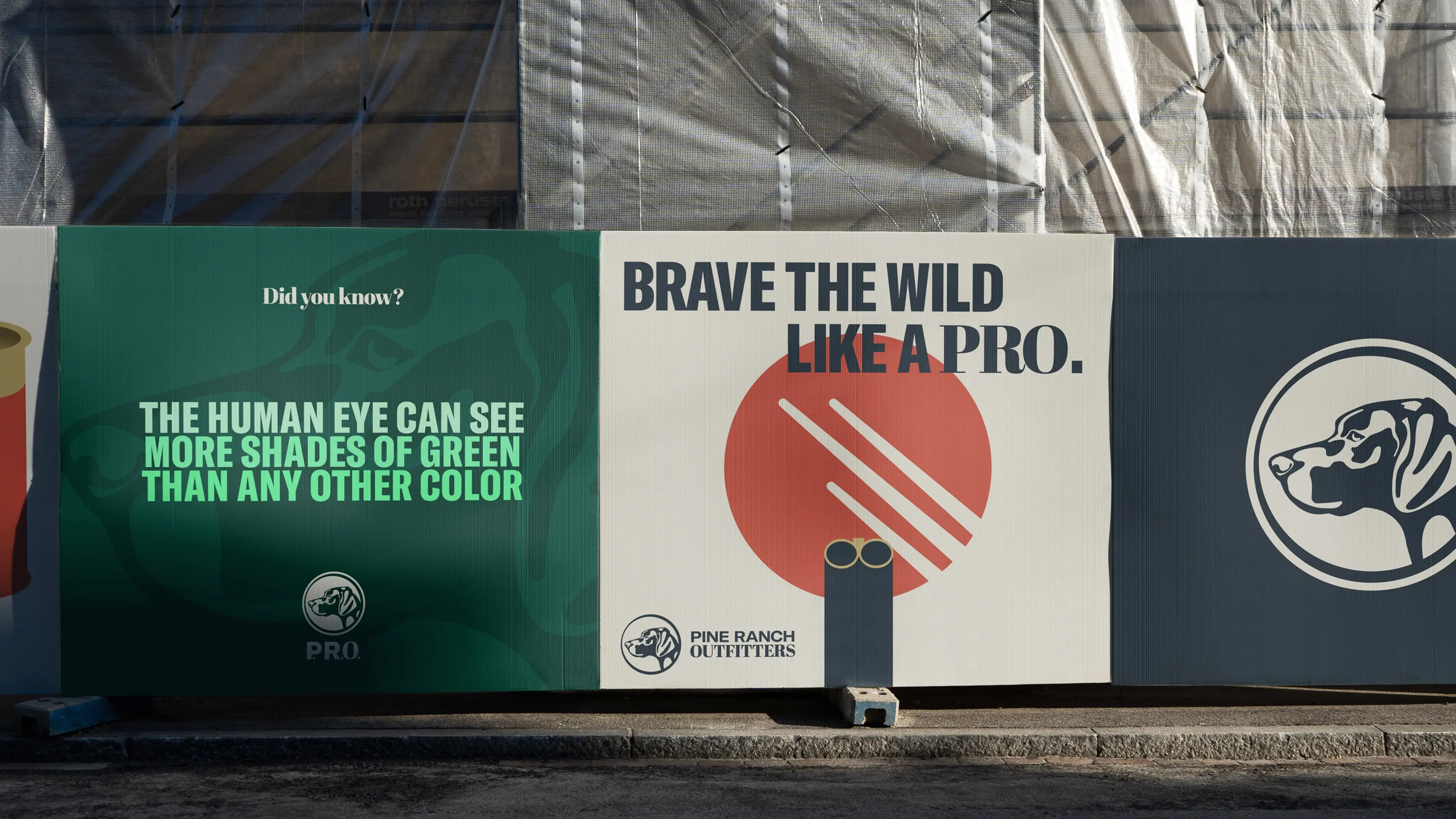 Pine Ranch Outfitters ads on a scaffolding billboard