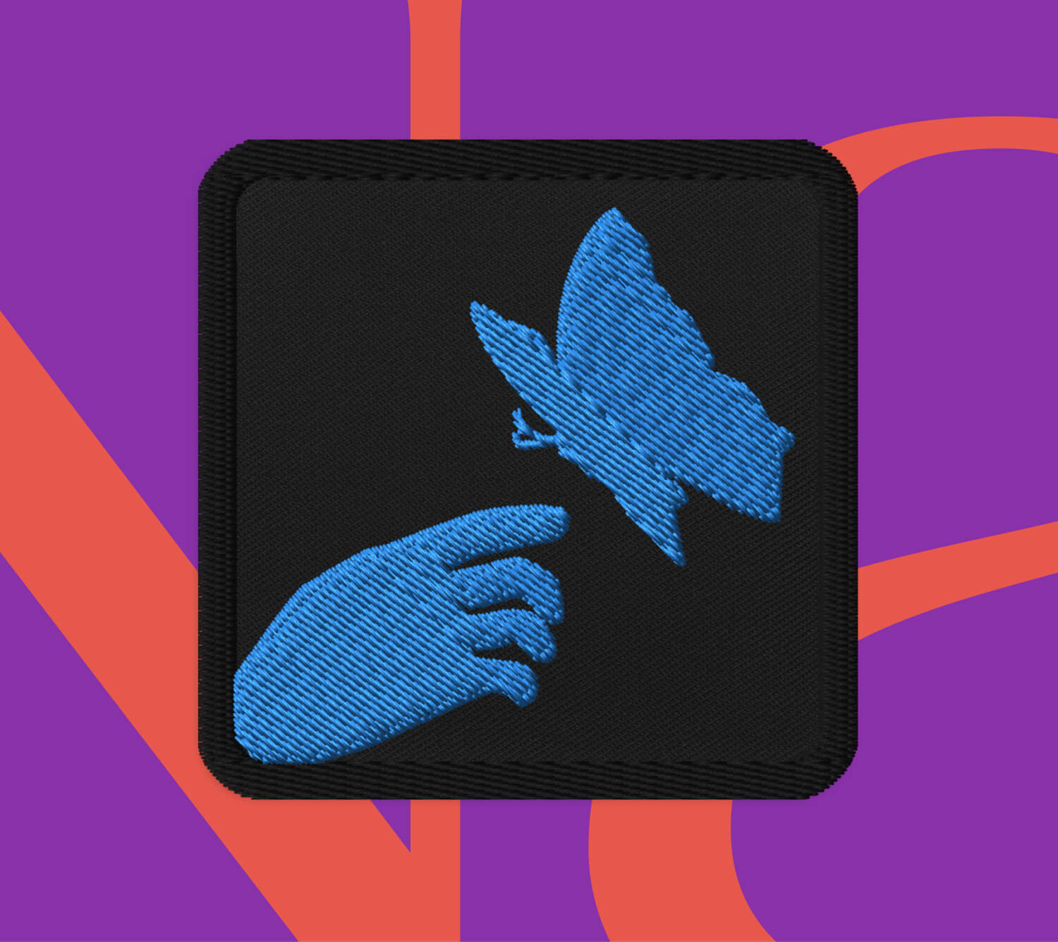 A square patch on a black background showing a blue silhouette of a hand reaching toward a butterfly, displayed against purple and orange graphic elements.